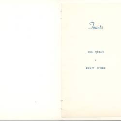 Open booklet with printed cursive text at right.