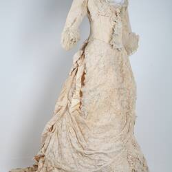 Ivory dress, full length with half-sleeves, front.