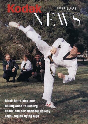 Magazine cover featuring man doing karate kick.