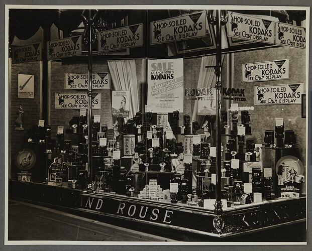 Shopfront display featuring sale of shop-soiled Kodak products.