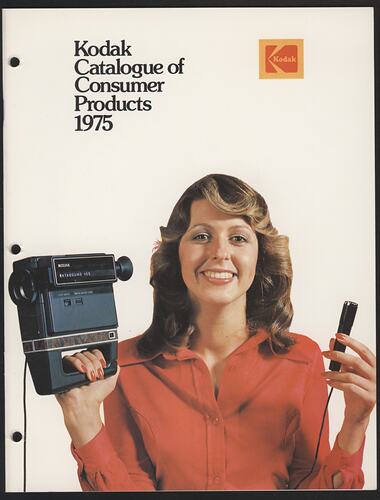 Cover page with photograph of woman and camera.