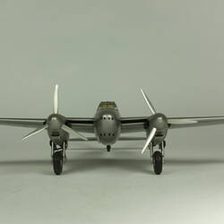 Silver model aeroplane.