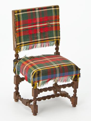 Toy wooden dining chair with tartan upholstery. From doll's house.