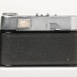 Black camera, metal top section. Back view.