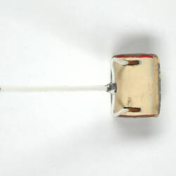 Plastic toy carpet sweeper, top view.