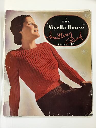 Colour front cover with image of woman in red jumper.