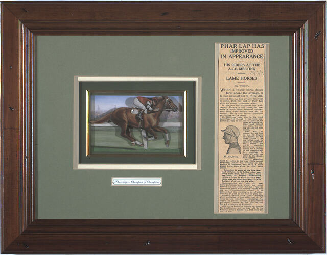 Framed picture of horse and newspaper clipping.