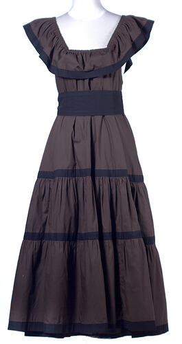 Brown cotton dress, horizontal black stripes, ruffle neckline.