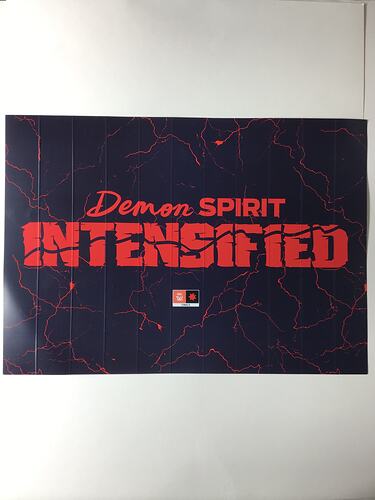 Blue placard with printed red details and text.