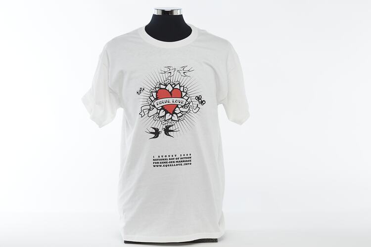 White t-shirt with heart motif, 'EQUAL LOVE' and two pairs of swallows.