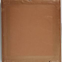 Back of framed picture. Brown paper covering.