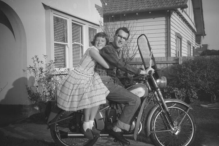 Digital Photograph - Man Sitting on Motorbike while Woman Sits Behind, Yarraville, circa 1958