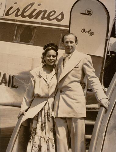 Digital Photograph - Man & Woman Boarding Oxley Plane to Tasmania, Essendon Airport, 1948