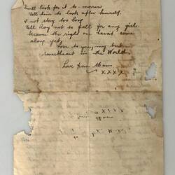 Reverse of handwritten letter on buff coloured paper, some of the page missing from insect damage. Cursive scr