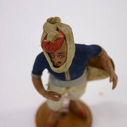 Indian Figure - Man with Bandaged Face, Clay