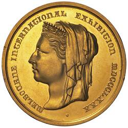 Round gold medal with female profile wearing crown facing left. Text around.