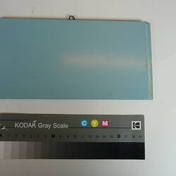 Painted board showing sample of blue colour.
