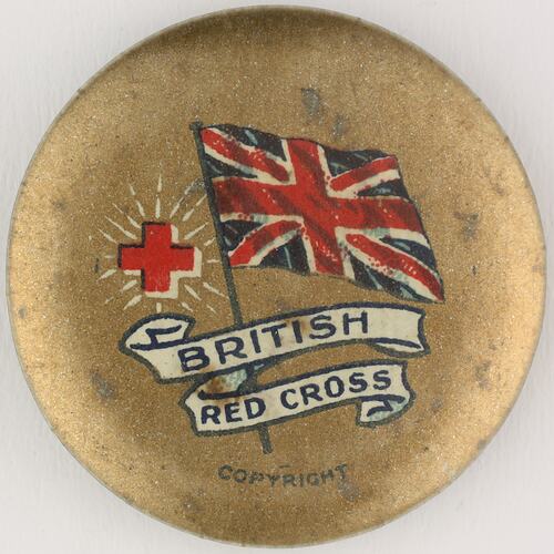 Round badge with British flag and red cross.