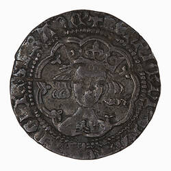 Coin, round, crowned bust of the King facing within a tressure of nine arches; text around.