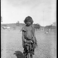 Arrernte boy wearing cast-off clothing at Alice Springs Telegraph Station, Alice Springs, Central Australia, 1901