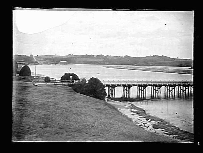River bank with bridge.