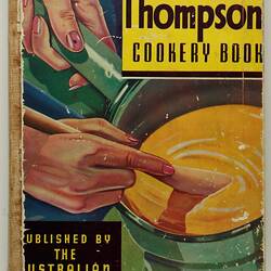 Hand stirring spoon in green pot with yellow liquid. Black text above.