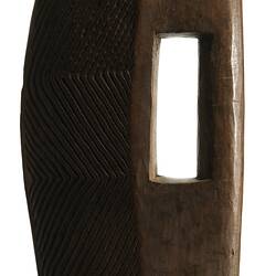 Wooden, wedge-shaped shield.