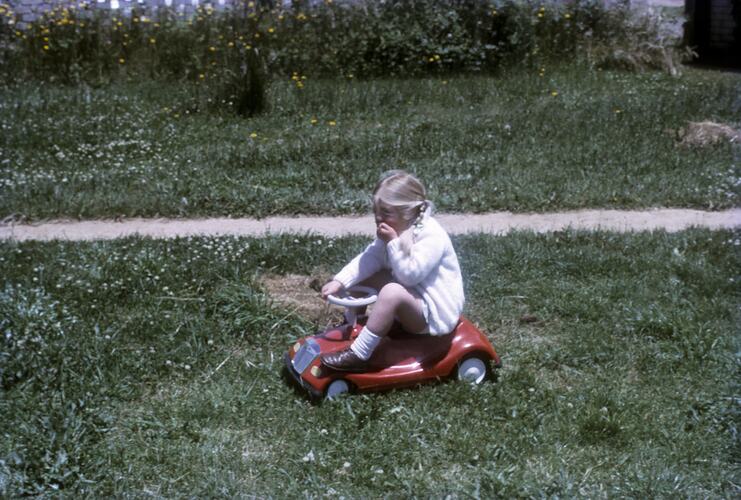 Catherine Black Riding Her Toy Car, Newbury, Victoria, circa 1972