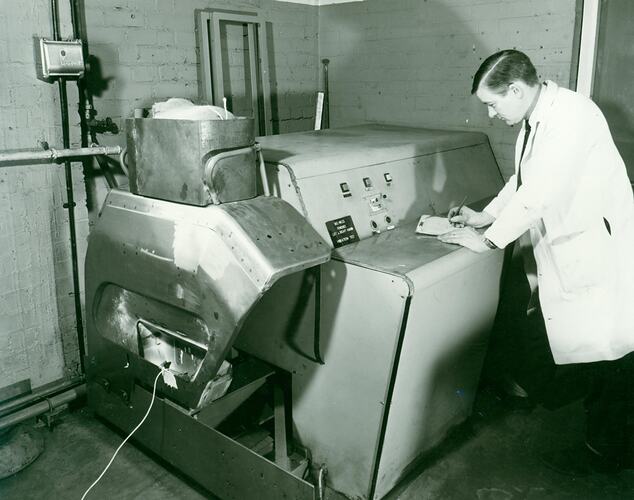 Man operating test machine.