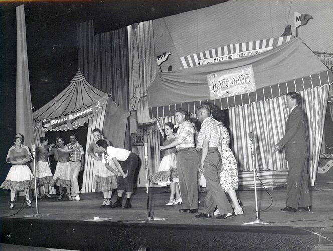 Performers on a stage.