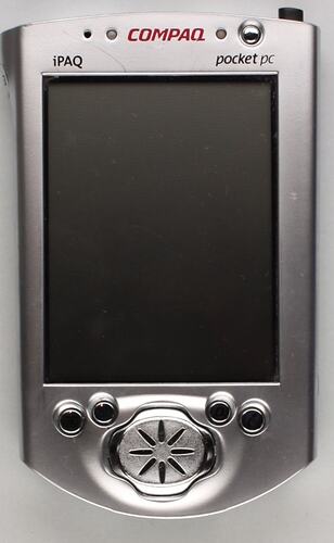 Silver 'Compaq' pocket PC, front view.