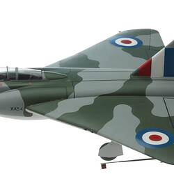 Wooden model grey and green camoflage aeroplane. Two air intakes at front and jets at rear. Black nose cone.
