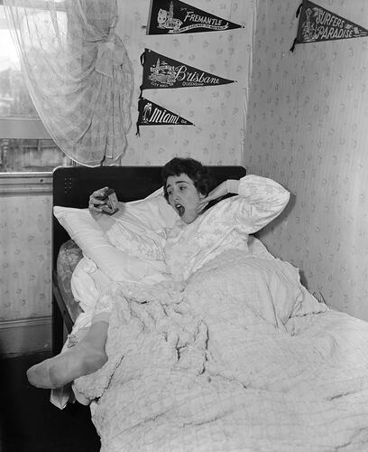 Woman Getting Out of Bed, South Melbourne, Victoria, 06 Aug 1959