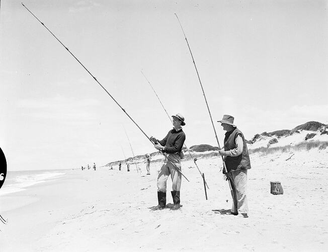 Monochrome photograph of a fishing competition.