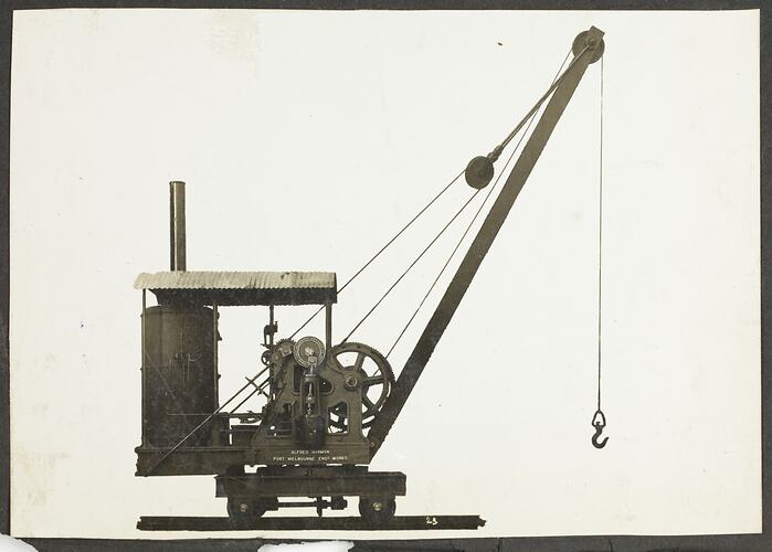 Monochrome photograph of an excavator.