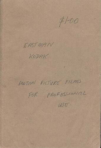 Handwritten text on brown cover page.