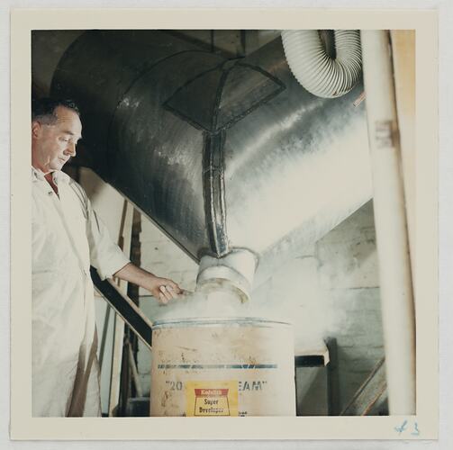 Powdered Chemicals Poured from Churning Machine Into Drum, Kodak Factory, Coburg, circa 1960s