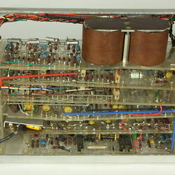 Side view of open metal box. Case removed to show internal wires and components.