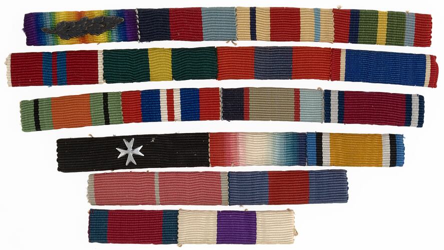 Group of ninteen mounted medal ribbons on five  bars.