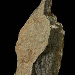 Irregular-shaped rock.