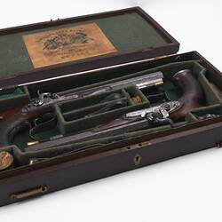 Pair of duelling pistols in wooden case.