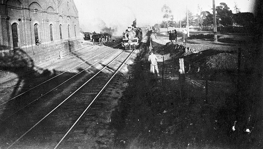 [A steam train at the Ballarat East locomotive sheds, Ballarat, 1930.]