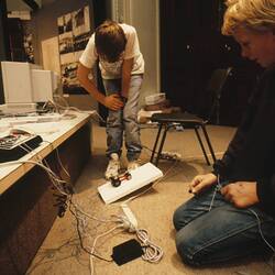 Digital Photograph - Virgil Bulow programming LEGO vehicle using Logo, Sunrise Classroom, Melbourne Museum, Russell Street, 1989