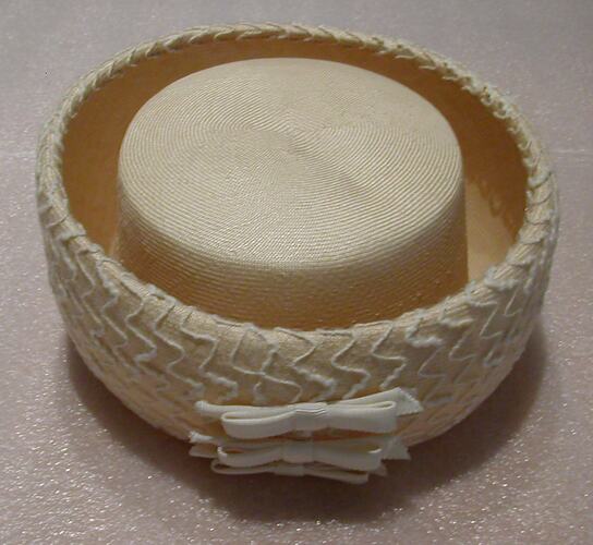 Cream Pillbox Hat, with white bows.