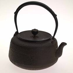 Charcoal iron tea kettle.