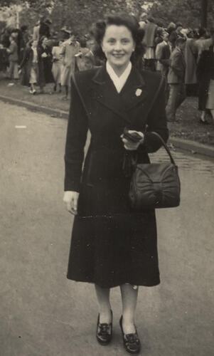 Digital Photograph - Woman on St Kilda Road, ANZAC Day, Melbourne 1947