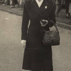 Digital Photograph - Woman on St Kilda Road, Anzac Day, Melbourne 1947