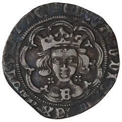 Coin, round, crowned bust of the King facing within a tressure of nine arches; text around.