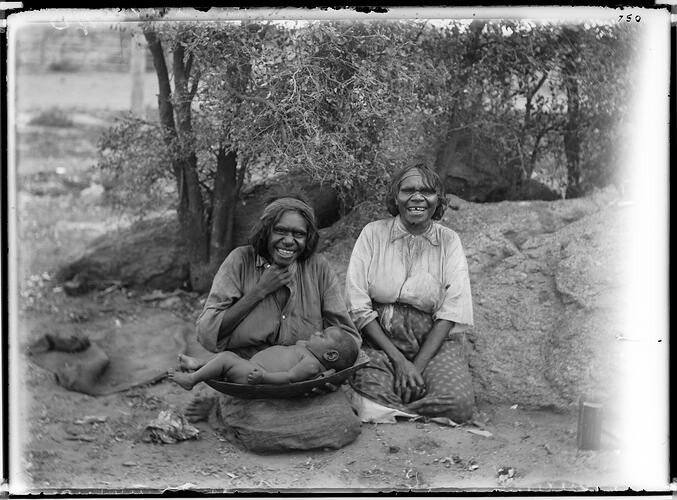Two Arrernte women with a baby, Alice Springs, Central Australia, 1895