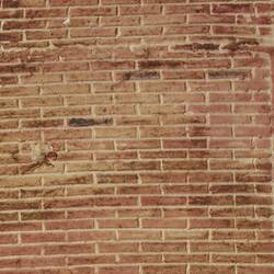 Detail of a red brick wall.